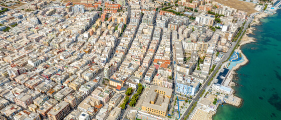 Aerial view of houses, buildings, apartments and roof of Manfredonia, in the province of Foggia, in...