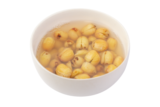 Boiled lotus seeds. Lotus seed sweet soup isolated. Lotus persimmon jelly millet flour boiled with sugar in white bowl.