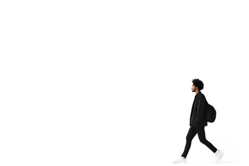 Obraz premium Side view of casual man walking isolated on white background