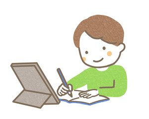 タブレットを使って勉強する子ども