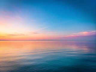 Fototapeta premium Serene Sunrise Over a Calm Ocean with Expansive Copy Space for Tranquil Designs and Nature Themes