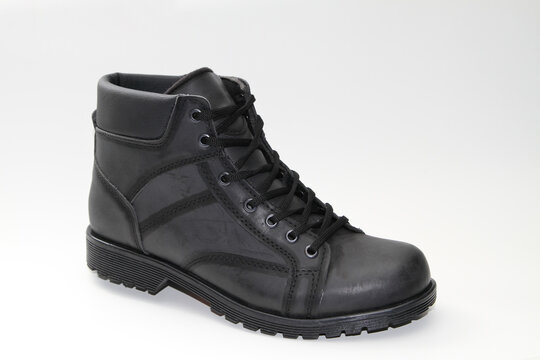 Men's boots. Waterproof leather. white background. Side view.