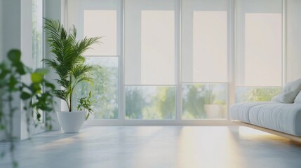 A white room with a large window and a potted plant