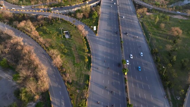 Islamabad Expressway, Faisal Avenue, A beautiful Road And margalla hills with Faisal Faisal Mosque drone view, Aerial.