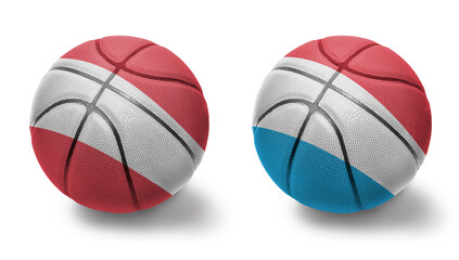 basketball balls with the national flags of luxembourg and austria on the white background.