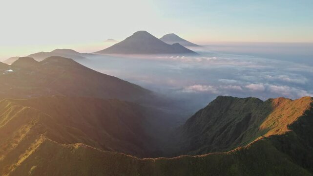 Aerial view of Mount Bismo in the morning, showcasing a stunning landscape with clear skies and a serene atmosphere, capturing the beauty of nature. High-quality 4K footage.