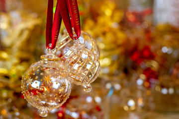 Christmas decorations hanging from the tree.