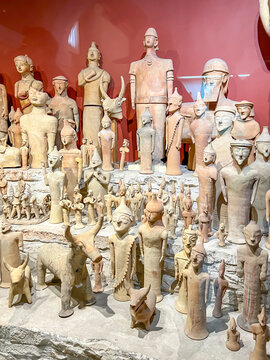 Nicosia, Cyprus, October 15, 2024: The Cyprus Museum, the main place hiding the history of the island. Interior - presentation of pottery vessels and figurines. Nicosia, Cyprus