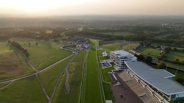 Drone flying above Epsom Downs Racecourse at sunset in Epsom, Surrey, England