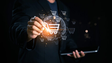 Businessman hand touching to virtual info graphics with trolley cart icons. Increase higher sale...
