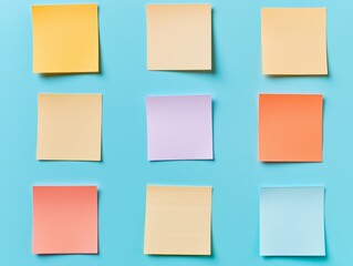 Self development planning. Colorful sticky notes arranged on a blue background for organization and creativity.