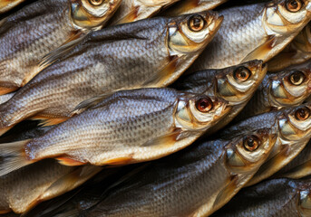 Fototapeta premium Dried Vobla fish from Russia, a perfect pairing with beer, offering a distinctive salty flavor and crunchiness that no other dried fish can match.