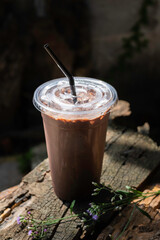 Iced cocoa smoothie in a plastic cup