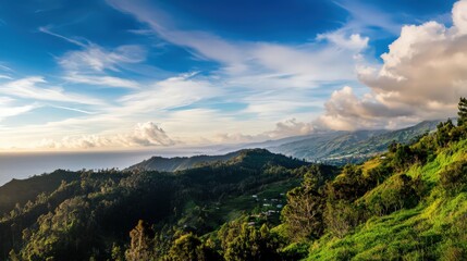 A beautiful mountain landscape with a clear blue sky and fluffy clouds