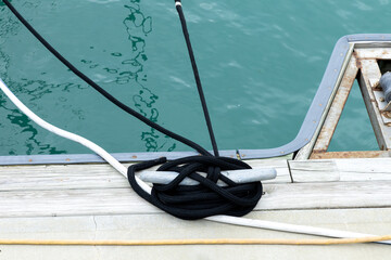 Tied rope and calm turquoise waters, showcasing a serene marina environment in Key West.