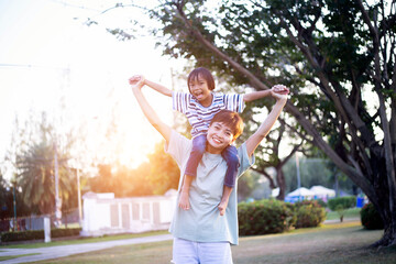 Happy family enjoying in the nature.