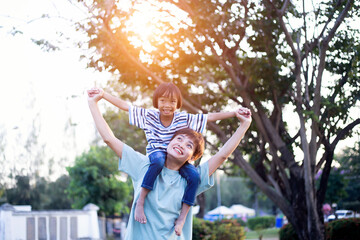 Happy family enjoying in the nature.