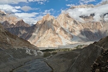 Obraz premium View of Hunza river valley and mountain ranges above Passu village. Karakoram mountain range. Gilgit-Baltistan region. Pakistan. Asia.