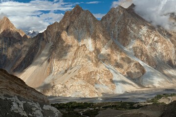 Obraz premium View of Hunza river valley and mountain ranges above Passu village. Karakoram mountain range. Gilgit-Baltistan region. Pakistan. Asia.