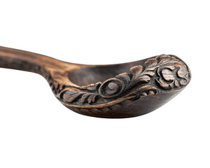 Intricately carved wooden spoon, displayed on a white isolated background.