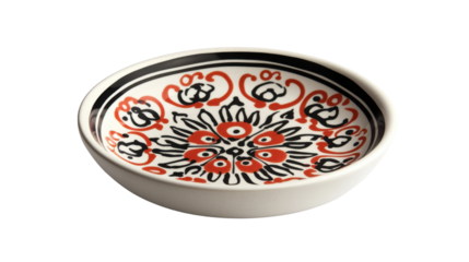 Decorative ceramic plate with intricate red and black floral design.