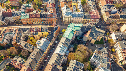Fototapeta premium Drone photo of urban architecture and old residential complexes in Krakow, Poland. Panoramic view.