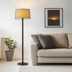 Living room with grey lamp, poster, and beige sofa.