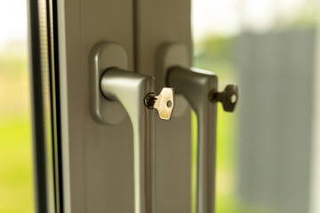 Close-up of a Window Handle with Keys