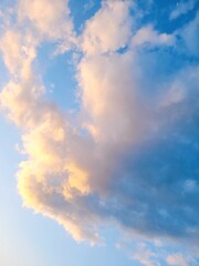 A vast expanse of clear blue sky stretches endlessly, its vibrant hue glowing with a serene...
