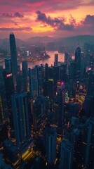 Fototapeta premium Aerial shot of a bustling cityscape at dusk, with skyscrapers illuminated by pastel-toned sunset reflections 