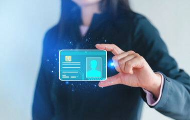 Woman is holding digital identification holographic ID card