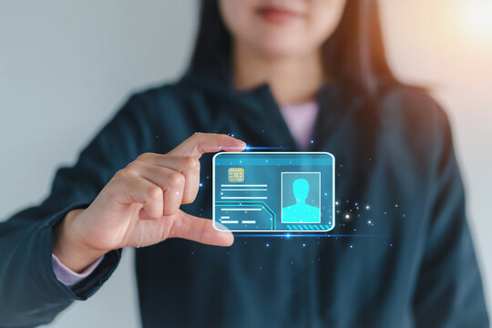 Woman is holding digital identification holographic ID card