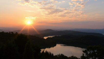 Fototapeta premium Breathtaking Sunrise Over Serene Lake, Perfect for Wall Art, Calendars, and Home Decor