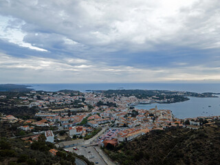 Obraz premium Aerial night city landscape of village and sea of Cadaques during summer Costa Brava