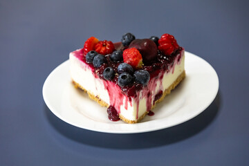 Traditional red fruit cheesecake with creative and luxurious decoration