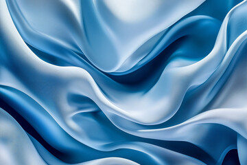 Obraz premium Elegant silk fabric texture with smooth flowing waves in shades of blue, creating serene and luxurious atmosphere. soft, glossy surface enhances visual appeal