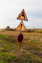 Triple weathered road sign - "Double curve, first at left", "Other hazards" and "Speed ​​limit (40 km/h)" between the villages of Yabalkovo and Krum, Haskovo Province, Southern Bulgaria