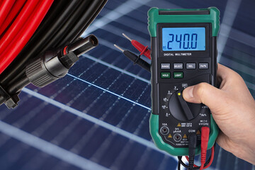 Digital Multimeter Measuring Voltage on Solar Panel