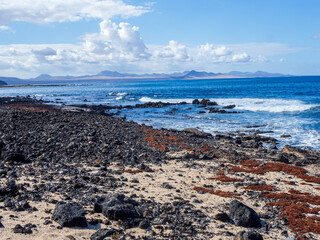 Rocky Shoreline of El Risco Beach with Ocean Waves - Lanzarote