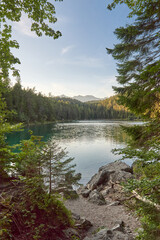 Scenic View of Eibsee Lake with Zugspitze Mountain at Sunset in Bavaria, Germany. Stunning Eibsee Lake with Zugspitze Reflection at Sunset in Bavaria, Germany. Tranquil Alpine Scene