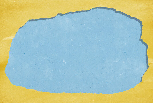 Applique creative collage background from paper pieces. Yellow paper frame border made from torn piece of paper. Creative collage background.