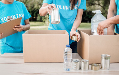 Charity food, Volunteer teamwork collecting donations to help people in need. Humanitarian aid,...