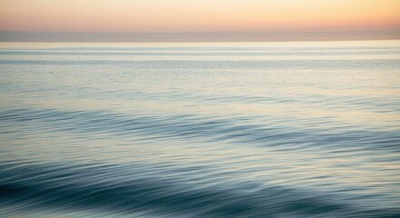 Tranquil sunset over gentle ocean waves scenic background for print and design