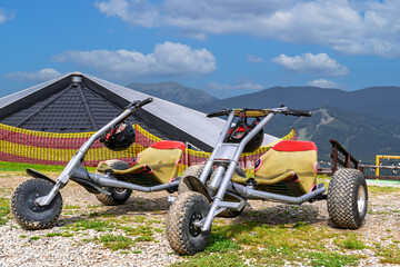 Mountain karting. The concept of entertainment and rest in mountain resorts. A Mountain Kart is a...
