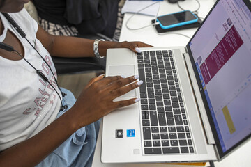 Office worker using computer, Accra, Ghana