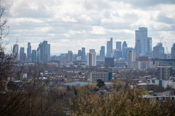 Fototapeta premium View of office buildings, skyscrapers and modern constructions from the viewpoint at Parliament hill in spring, North London, UK