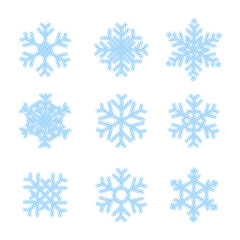 Dotted halftone snowflakes set, ornate Polka dot winter snowy elements. Vector illustration with isolated prefect circles