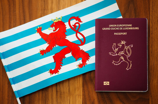 Passport of Grand Duchy of Luxembourg on the Luxembourg flags background, copy space