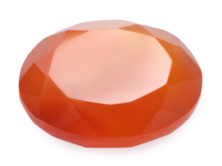 One orange shiny gemstone isolated on white