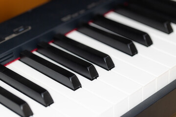 Closeup of black and white piano keyboard